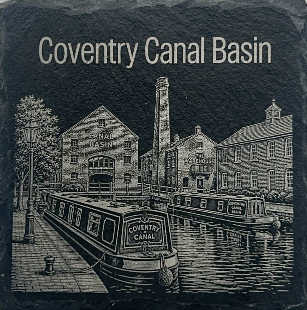 Coventry Canal Basin with buildings and boats engraved on slate