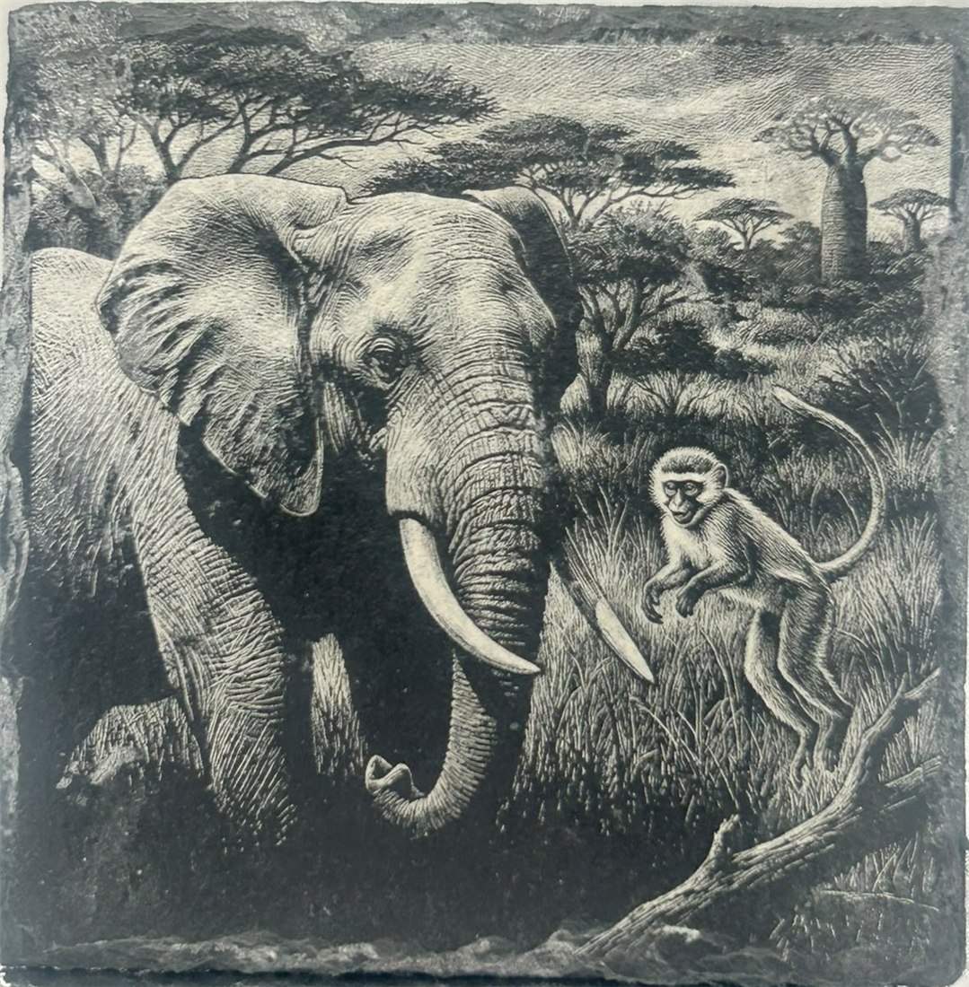 Elephant and monkey design on a slate-textured surface