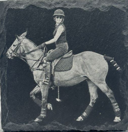 Slate engraving example of a rider on horseback